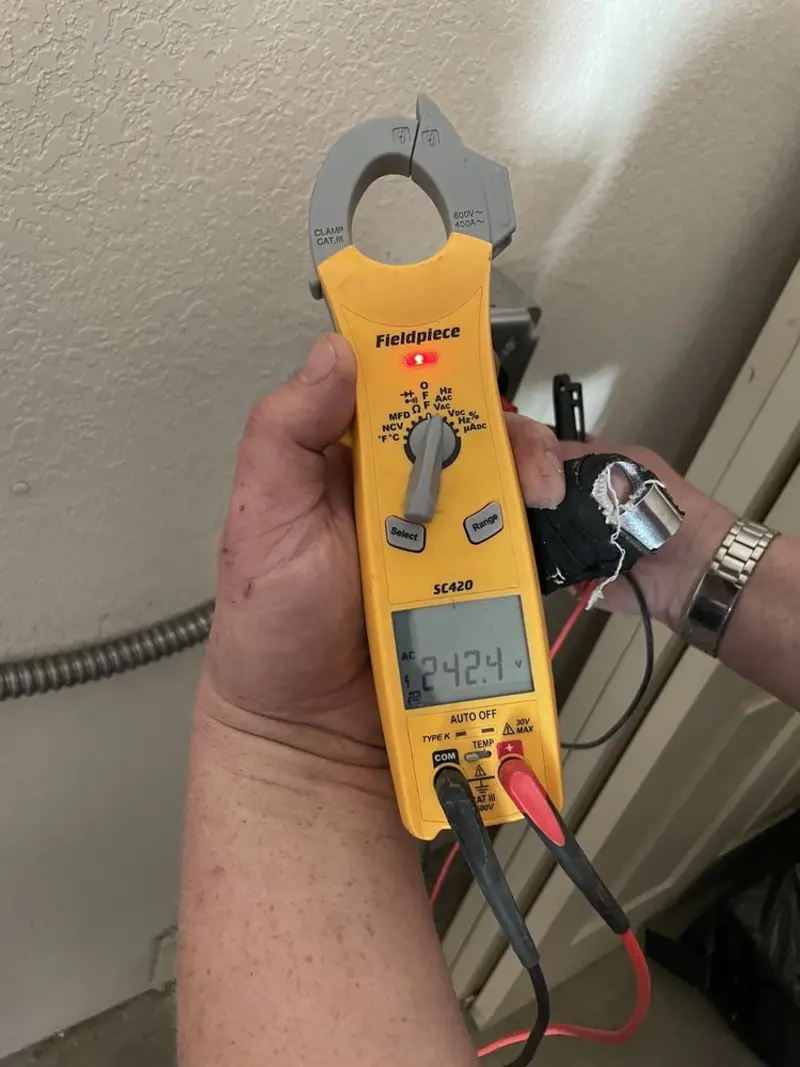 Voltage testing with clamp meter during Generator Installation in Johnstown